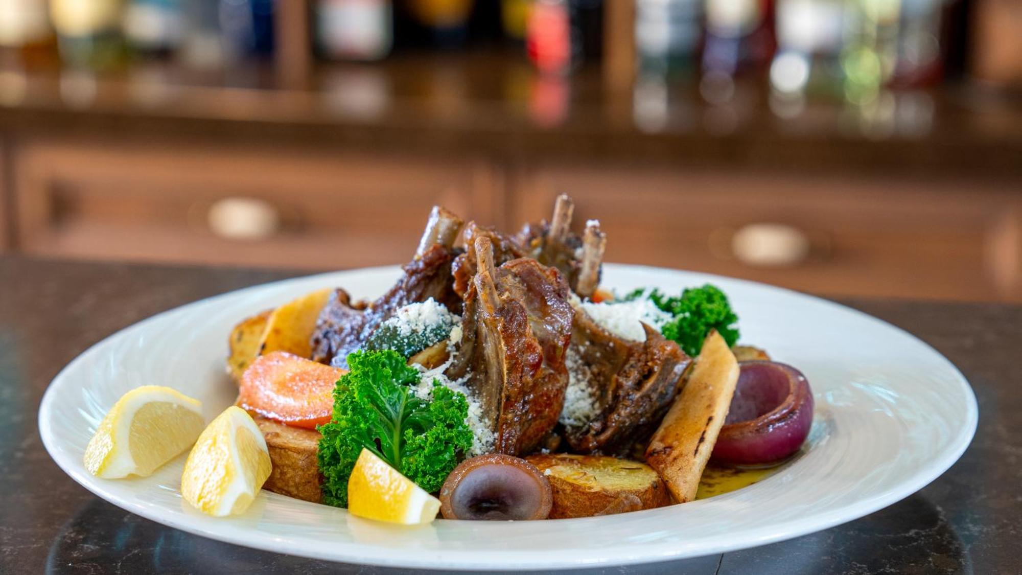 Boutique Odyseja & Spa Ciechocinek Eksteriør billede A plate of grilled lamb chops