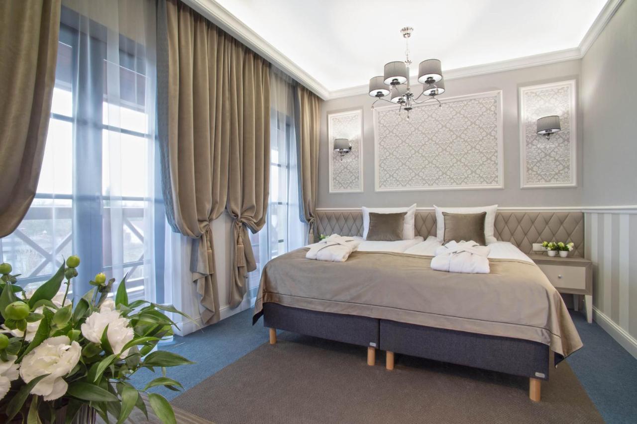 Boutique Odyseja & Spa Ciechocinek Eksteriør billede A bedroom in the hotel